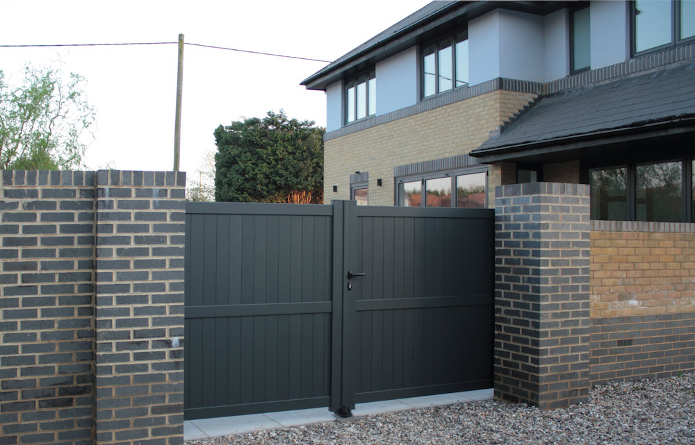 Grey automated driveway gates